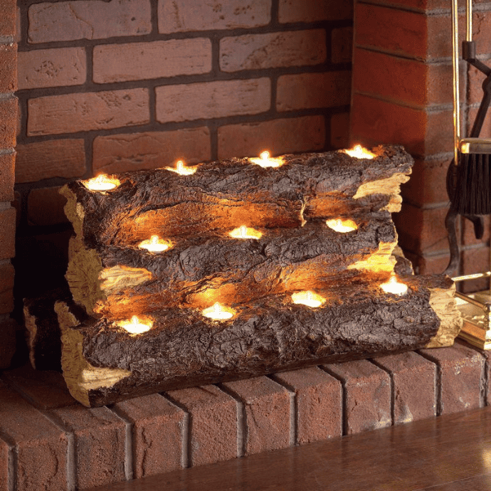 Decorate a fireplace with flameless candles, wood log candle holders