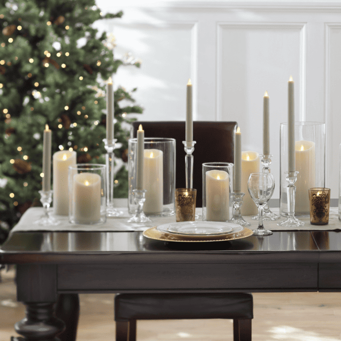 Christmas centerpiece ideas with candles, candle hurricanes, taper candle holders