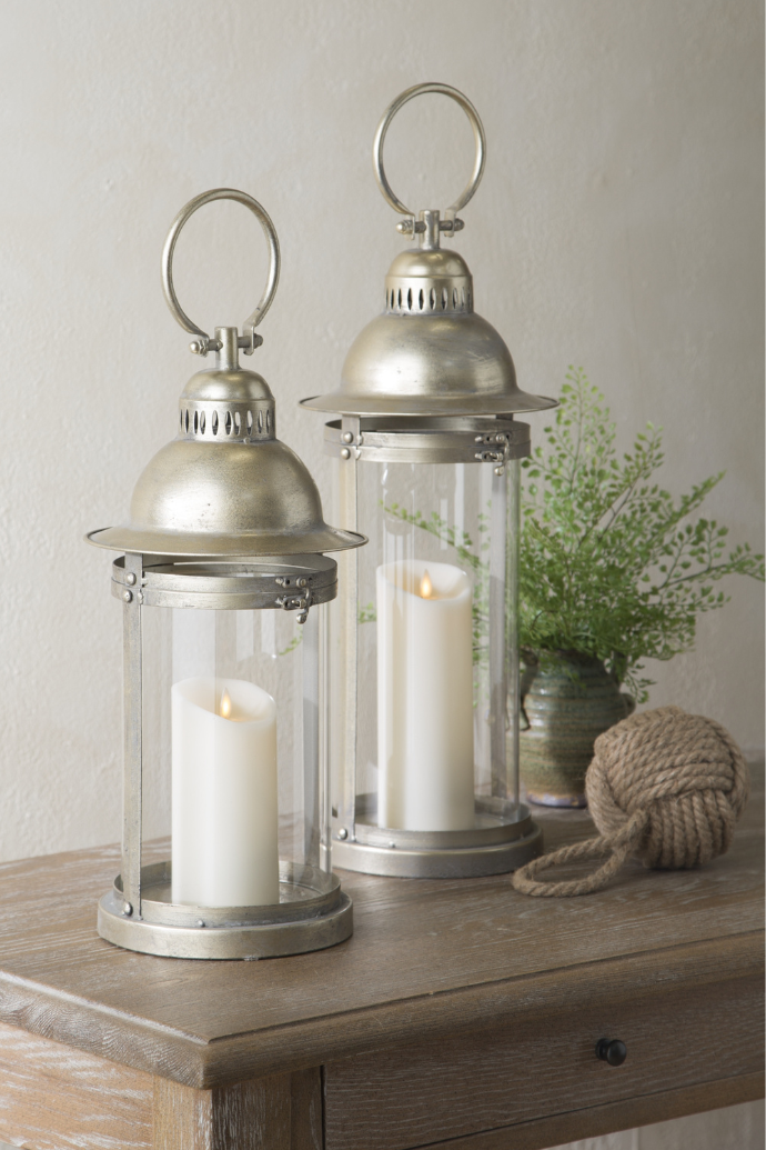 Buy flameless candles with lanterns on sideboard