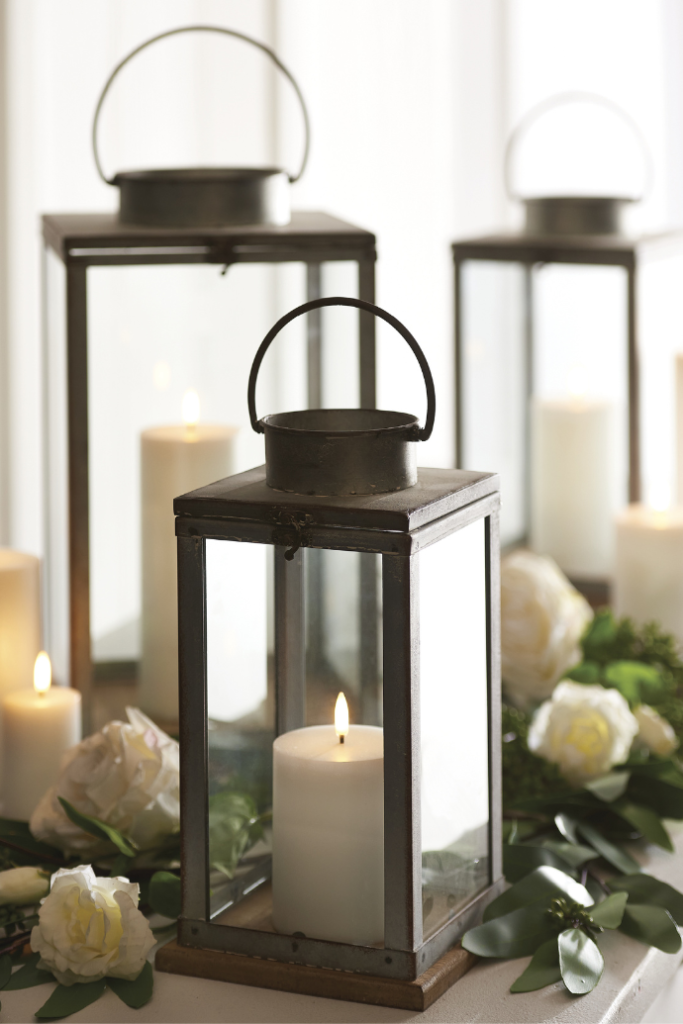 Candle decoration ideas with lanterns, greenery, flameless candles