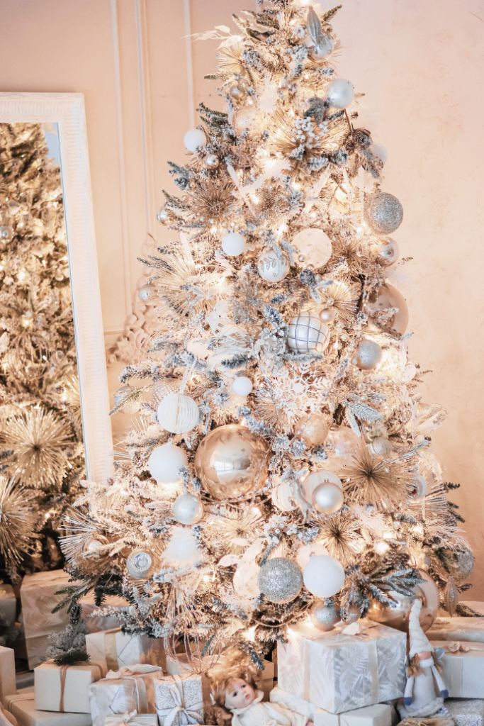 flocked Christmas tree with metallic ornaments