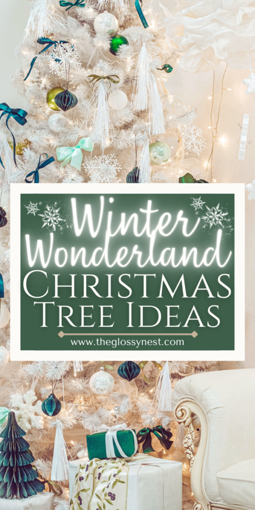all white Christmas tree with green ornaments