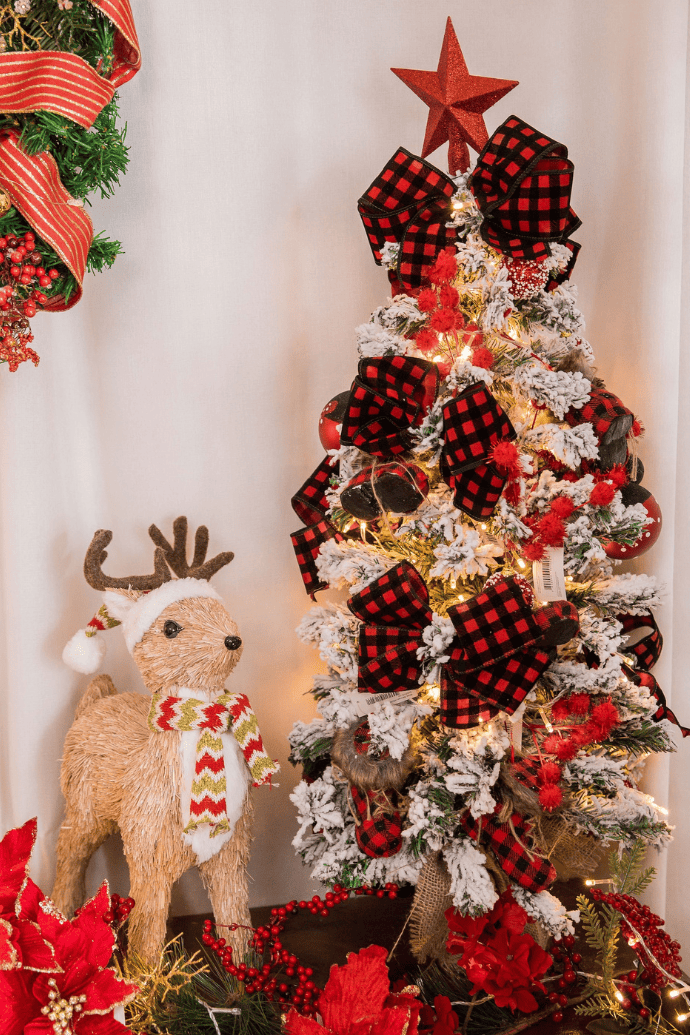 small farmhouse christmas tree with buffalo plaid ribbon