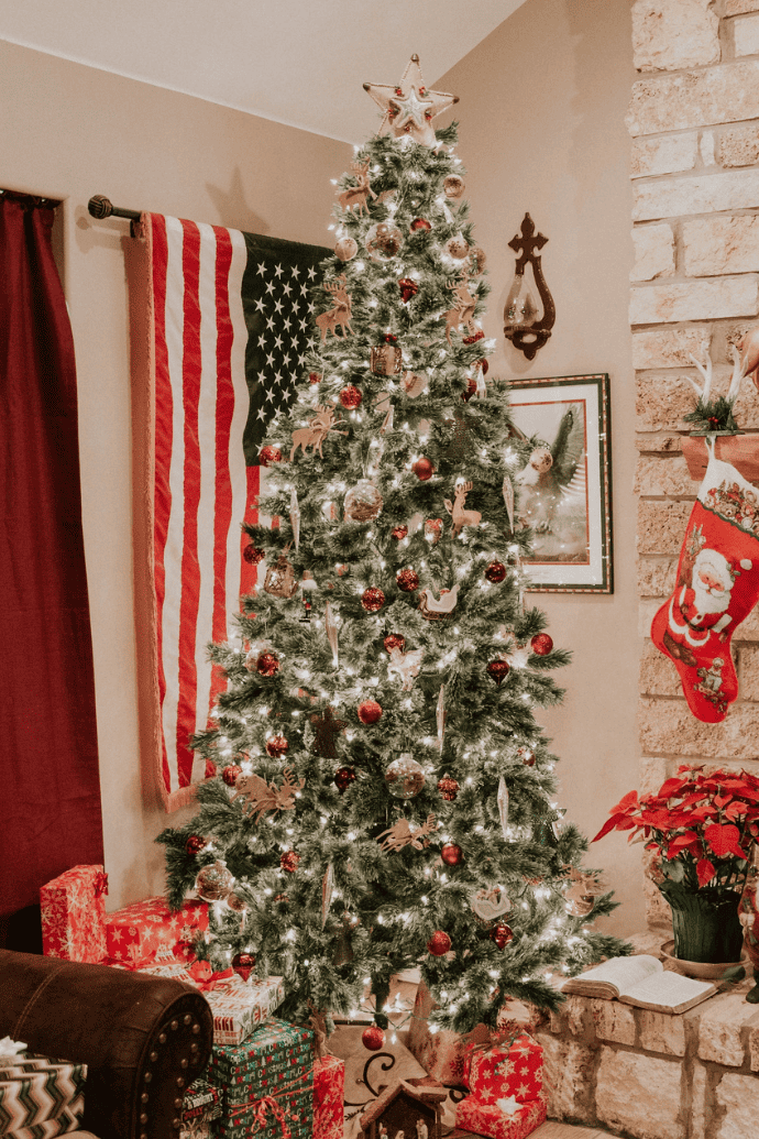 farmhouse christmas tree with flag, presents
