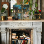 books in an empty fireplace