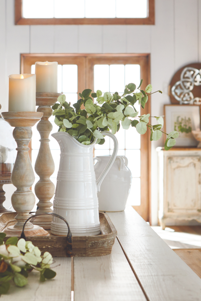 Candle decoration ideas with lanterns, greenery, flameless candles, candle holders