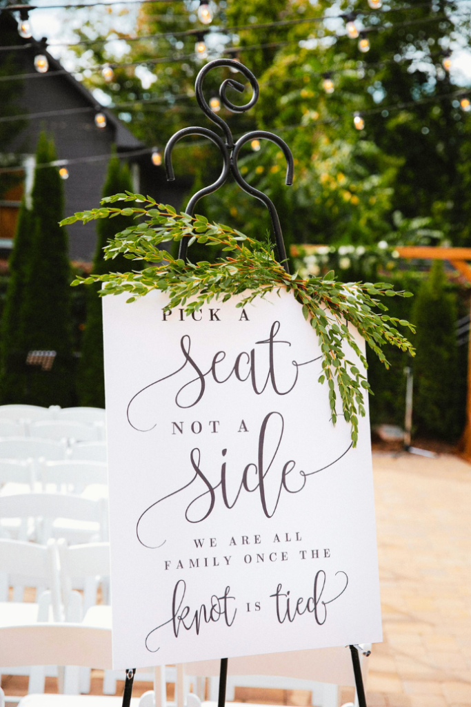 wedding sign on easel for ceremony