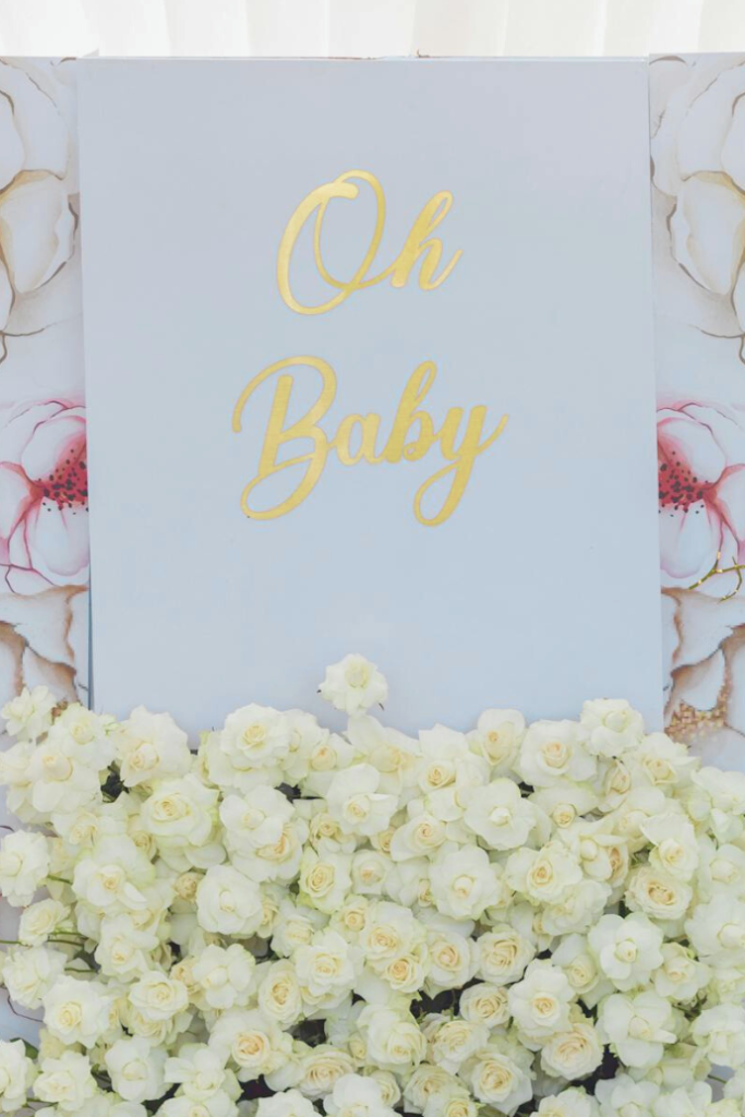 oh baby wedding neon sign with flowers, backdrop