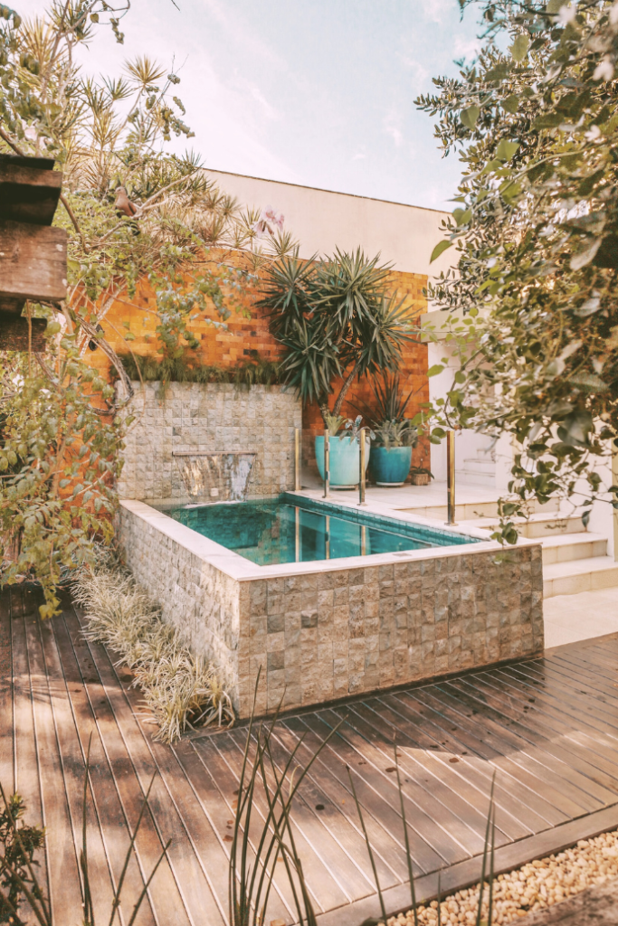 potted plants by small pool deck